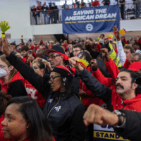 Workers attend a rally at the United Auto Workers (UAW) Local 551 in Chicago on October 7, 2023. PHOTO BY JIM VONDRUSKA/GETTY IMAGES